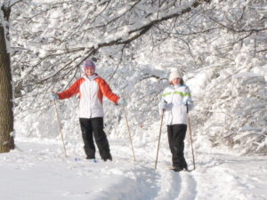 My sister and I, again, on our cross-country skies. Not having to worry about flying too fast down a slope and risk crashing into another skier or a tree, I found cross-country skiing to be a much more meditative experience. (2008)